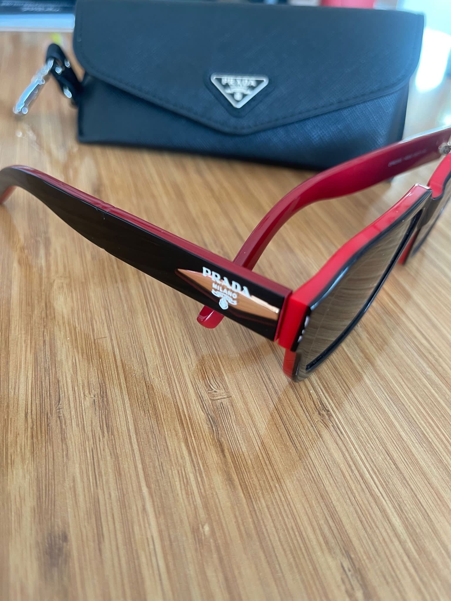 Мужские солнцезащитные очки Prada